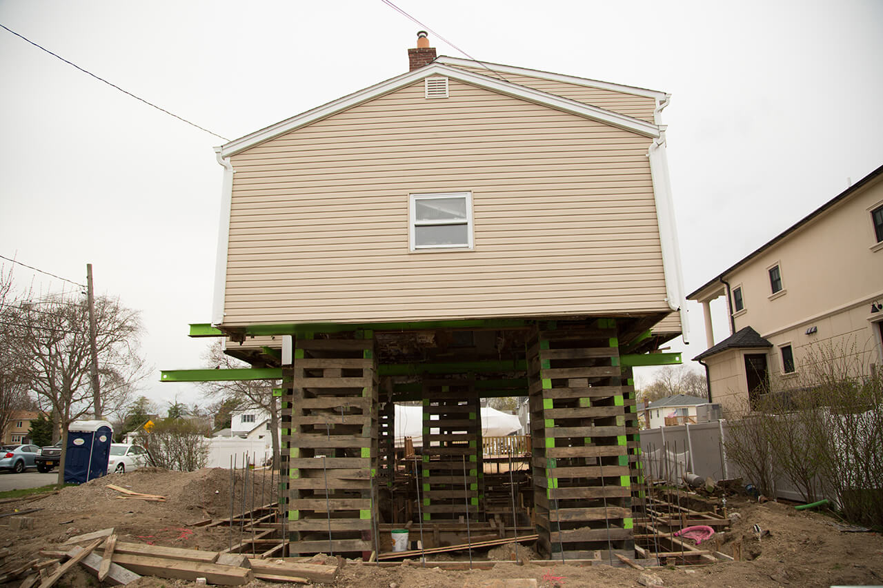 raising the foundation of a home with a house lift