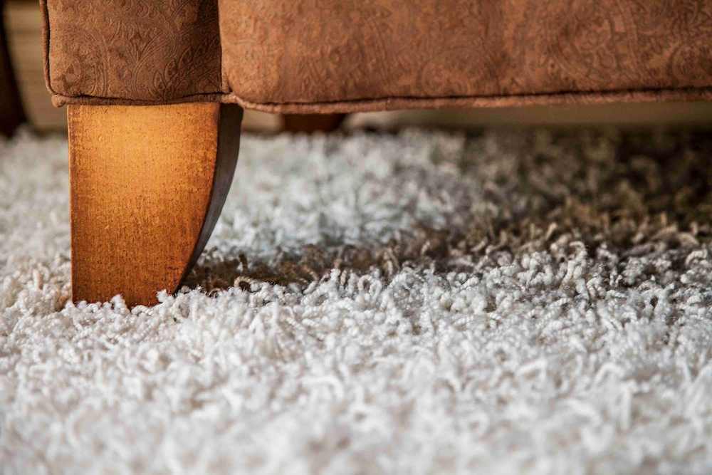 Carpet under furniture