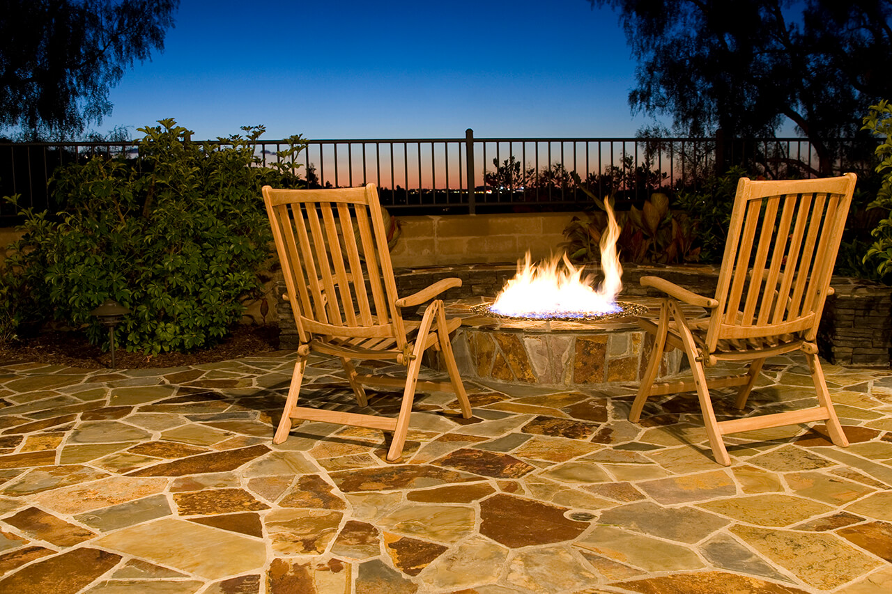 newly installed flagstone patio with firepit